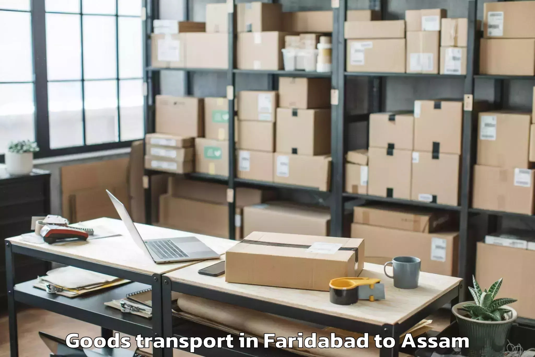 Top Faridabad to Pachim Nalbari Goods Transport Available